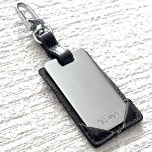 NWOT! TUMI Mirrored Leather Luggage Tag!